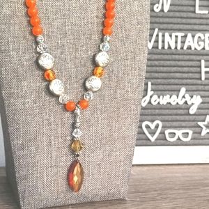 Aurora borealis glass w Lotus & orange Artisan beaded necklace